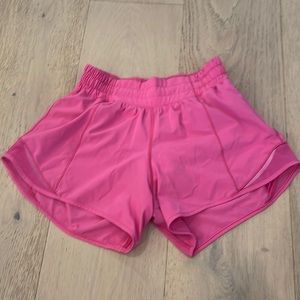 Lululemon hotty hots, size 2, 4”, sonic pink athletic shorts.